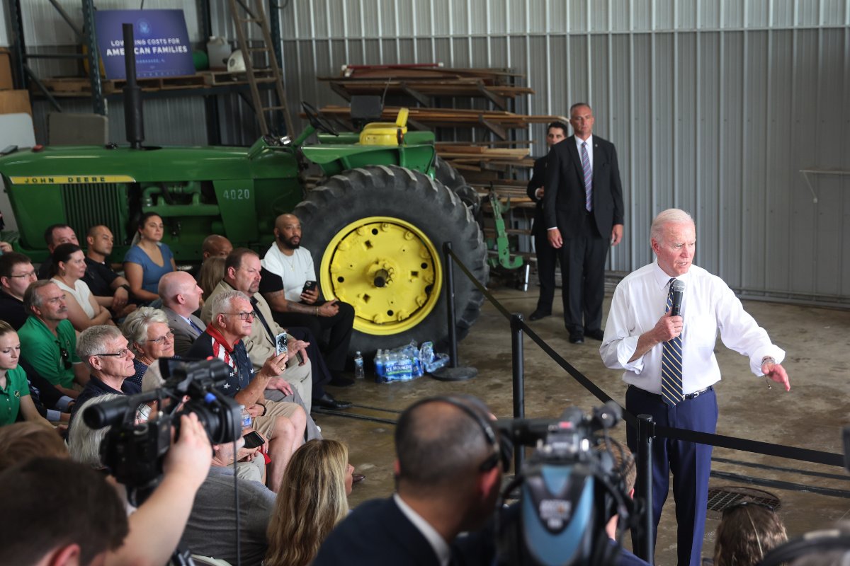 U.S. President Joe Biden speaks to guests gathered at the O'Connor Grain Farm on May 11, 2022 in Kankakee, Illinois. Biden visited the farm along with Agriculture Secretary Tom Vilsack to discuss the impact of Russia's invasion of Ukraine on food supply and prices. (Photo credit: Scott Olson/Getty Images)
