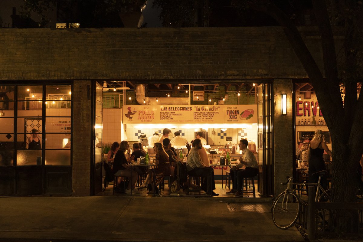 New York City, USA. People dining at a Mexican restaurant in the West Village. (Photo credit: zxvisual/Getty Images)