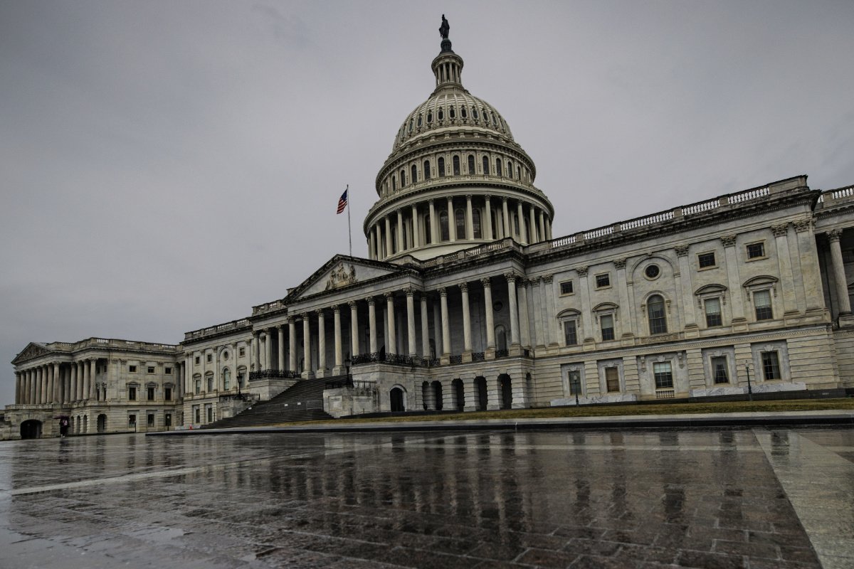 WASHINGTON, DC - FEBRUARY 11: The U.S. Capitol building is seen in the rain on February 11, 2024 in Washington, DC. The Senate is convening for a rare Sunday session to vote on a supplementary spending bill that includes military aid for Ukraine, Israel, and Taiwan without addressing border security after Republicans in the House abandoned an agreement that they initially agreed to. (Photo by Samuel Corum/Getty Images)